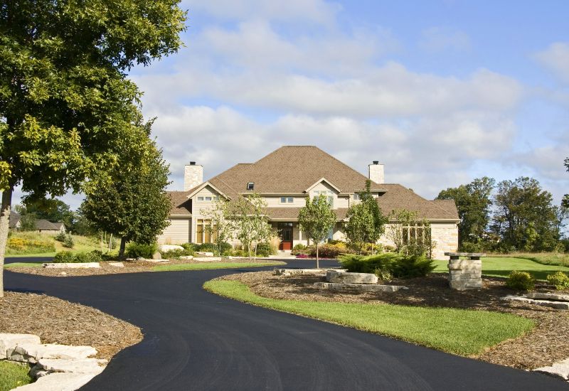 Residential Asphalt Driveway with Landscaping